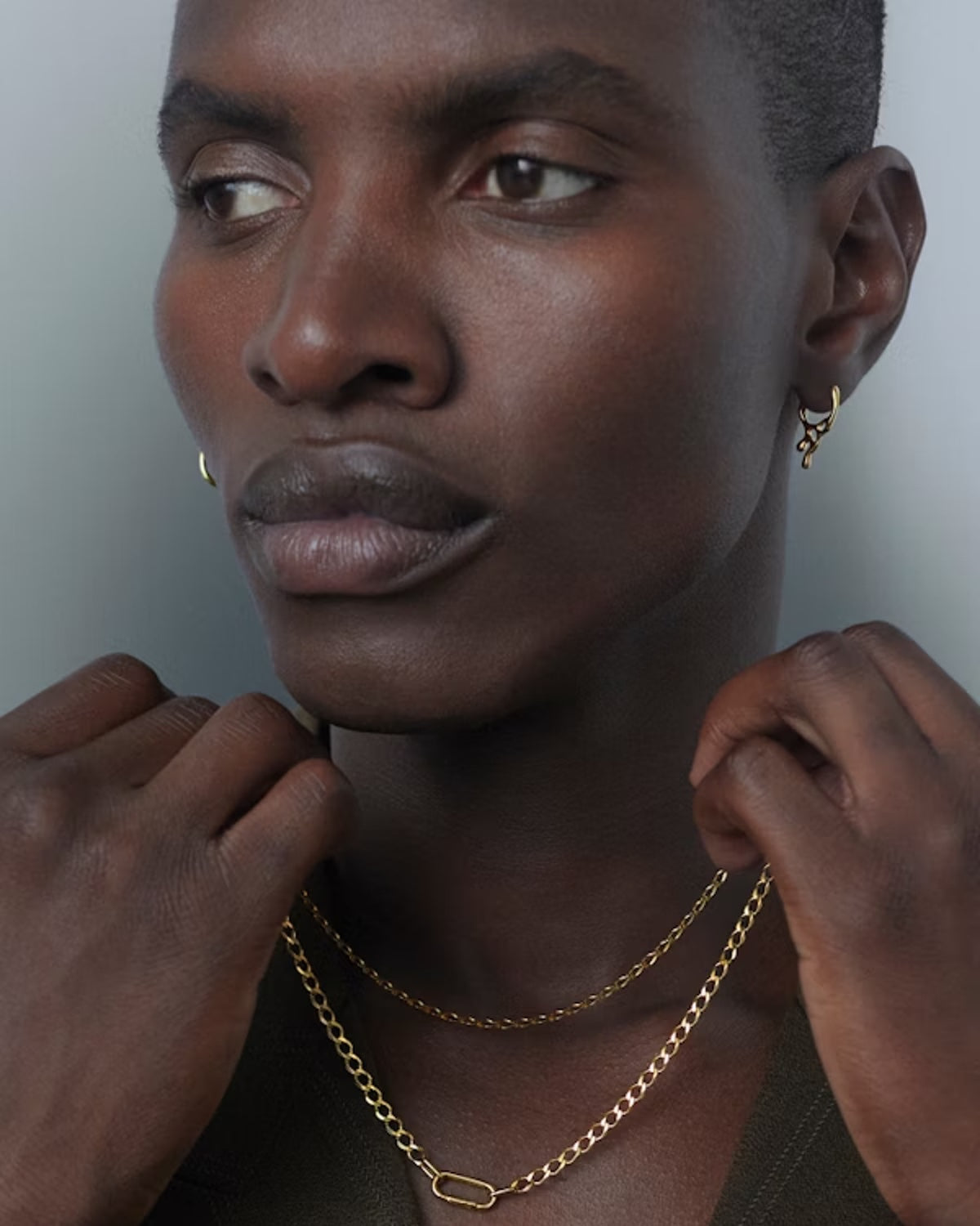 Sortedam Huggie - Goldplated Silver