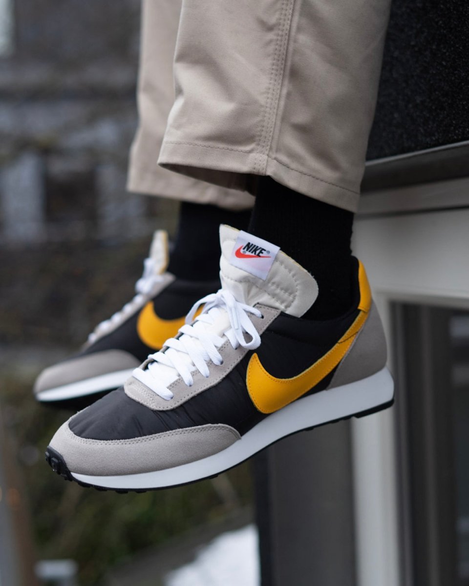 nike tailwind 79 black gold